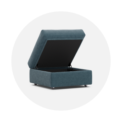 Blue storage ottoman with open lid on a white background