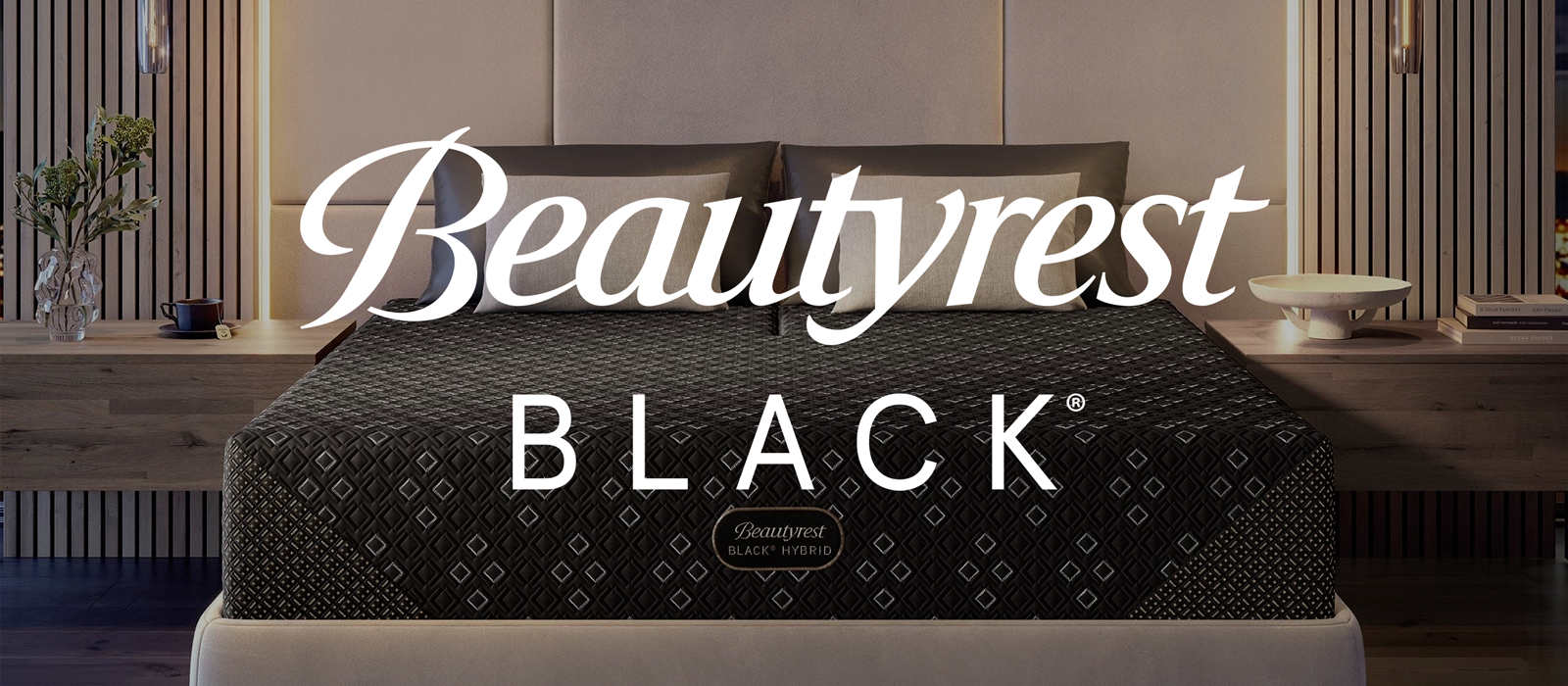 Beautyrest Black mattress in a bedroom setting with the Beautyrest Black logo on top