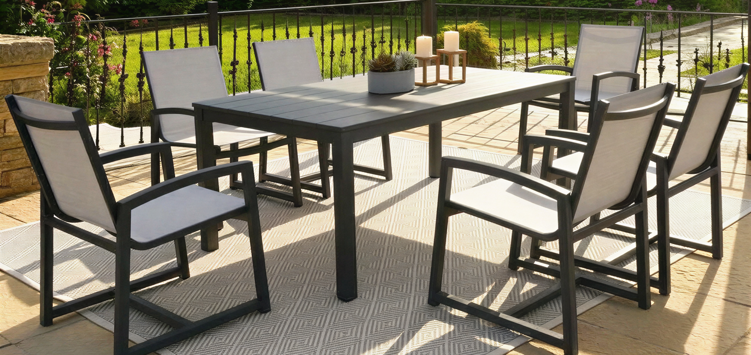 Outdoor patio set with table and chairs under a pergola on a sunny day.
