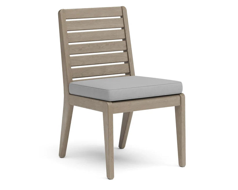 Wooden chair with a gray cushion on a white background