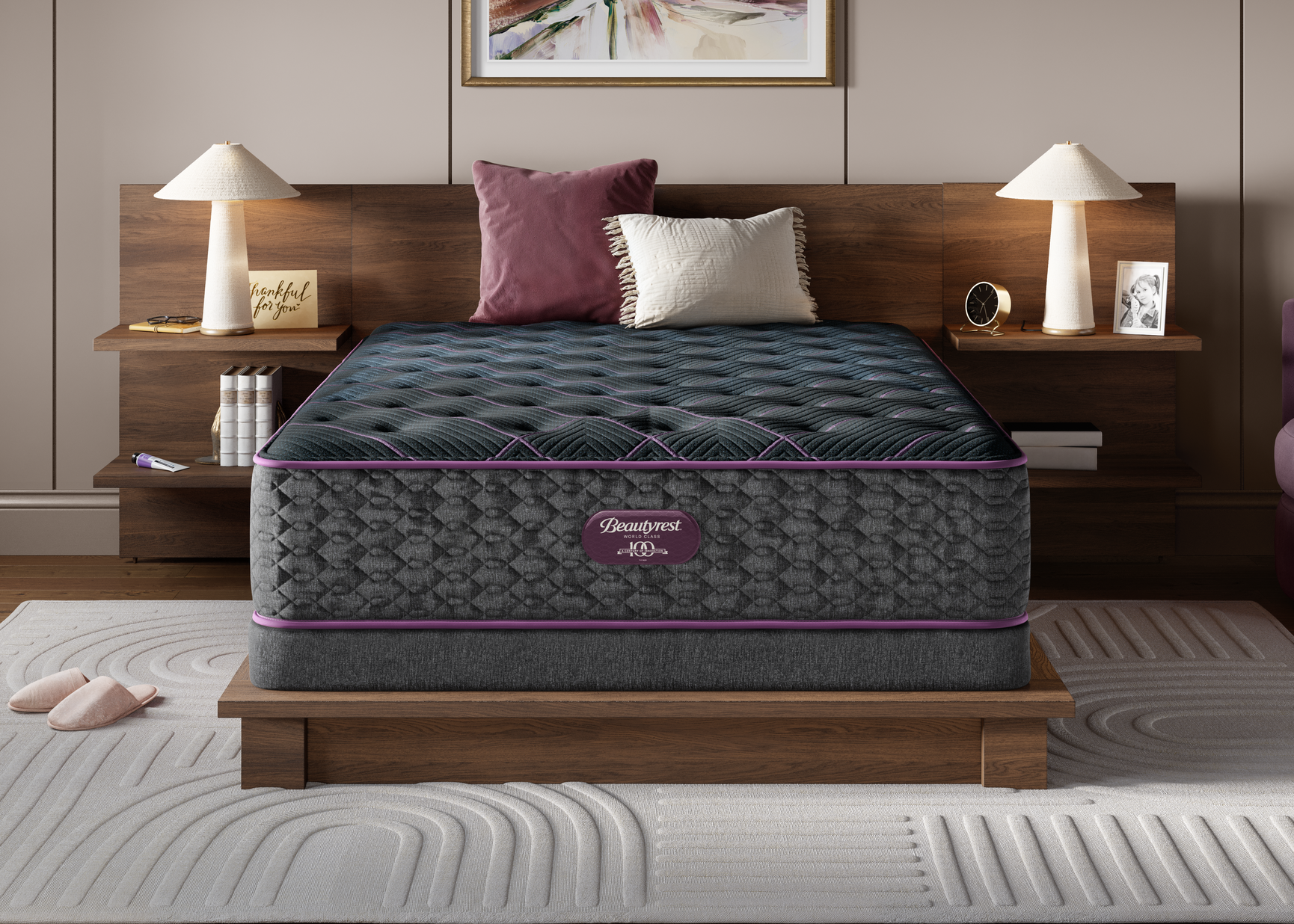 Gray Plush mattress with purple accents on a wooden bed frame in a bedroom setting.